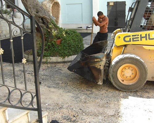 עבודות אספלט בחצר ביס כרמילית חיפה